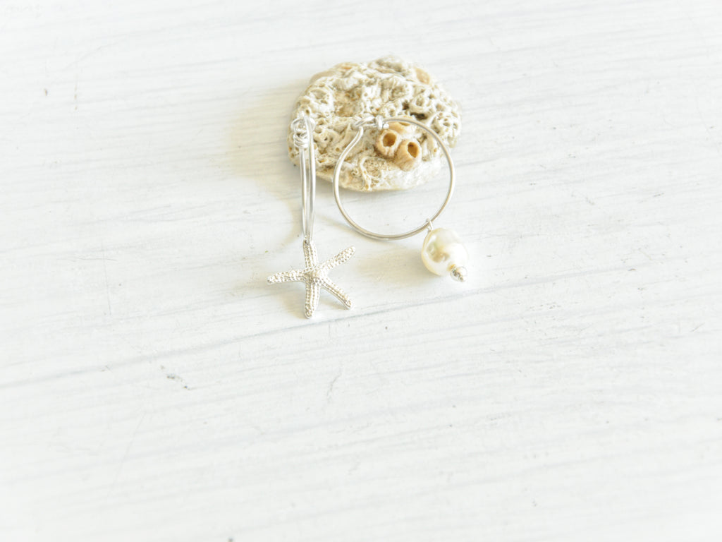 Orecchini Stella Maris, pendenti con perla e stella marina, fatti a mano in Argentium